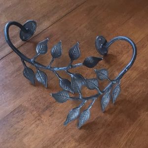 Curtain and drape wall holders. Branch and leaf design.
